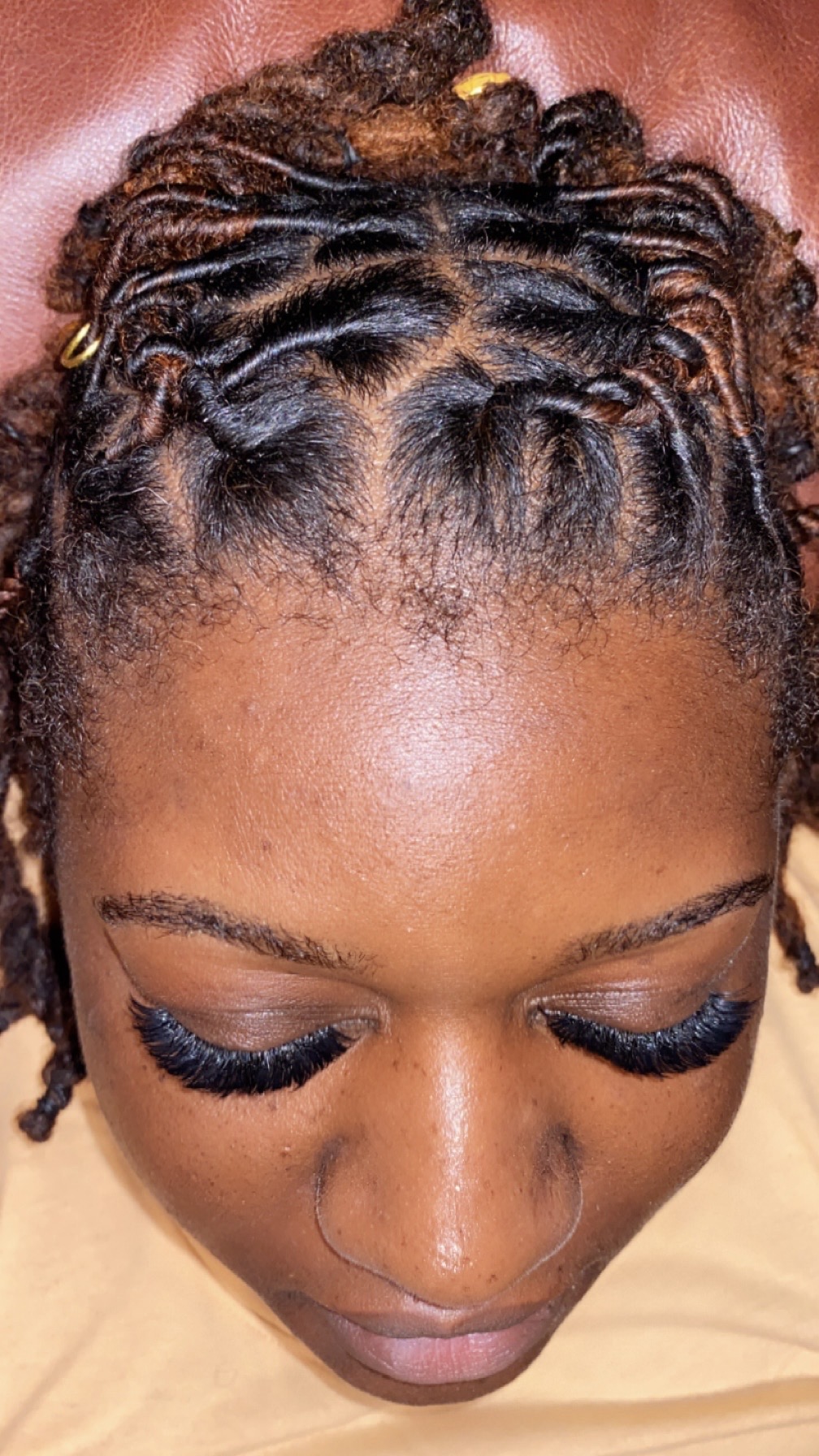 Close-up of a finished lash set and shaped brows